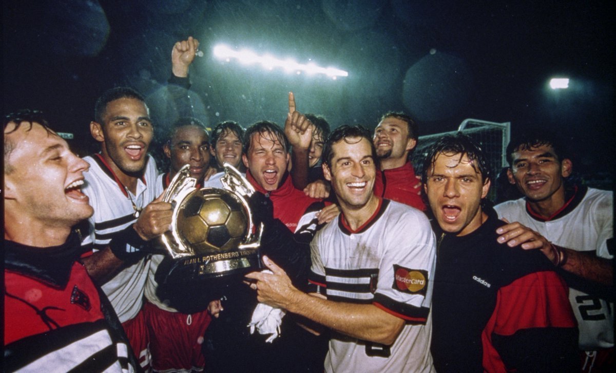 DC United celebrating their 3-2 victory over the Los Angeles Galaxy in the first ever championship game of MLS (1996).
